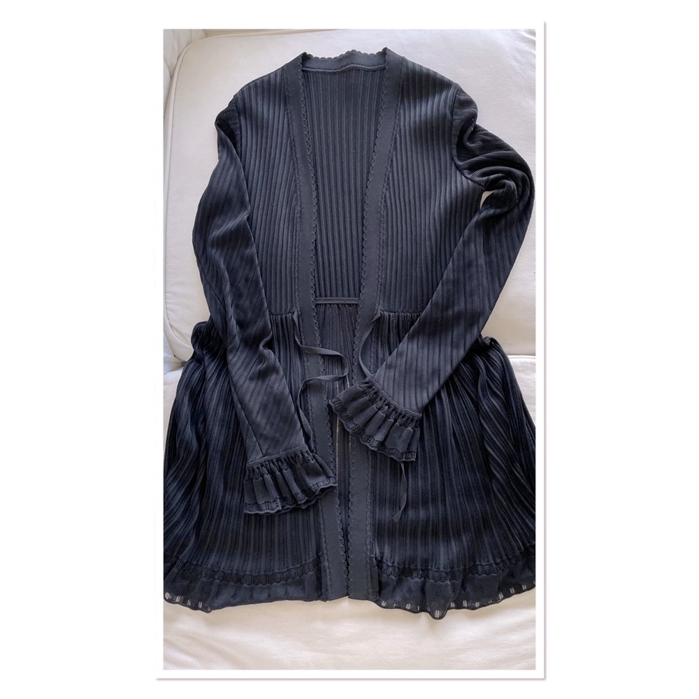 ALAIA ruffled ribbed-knit top
